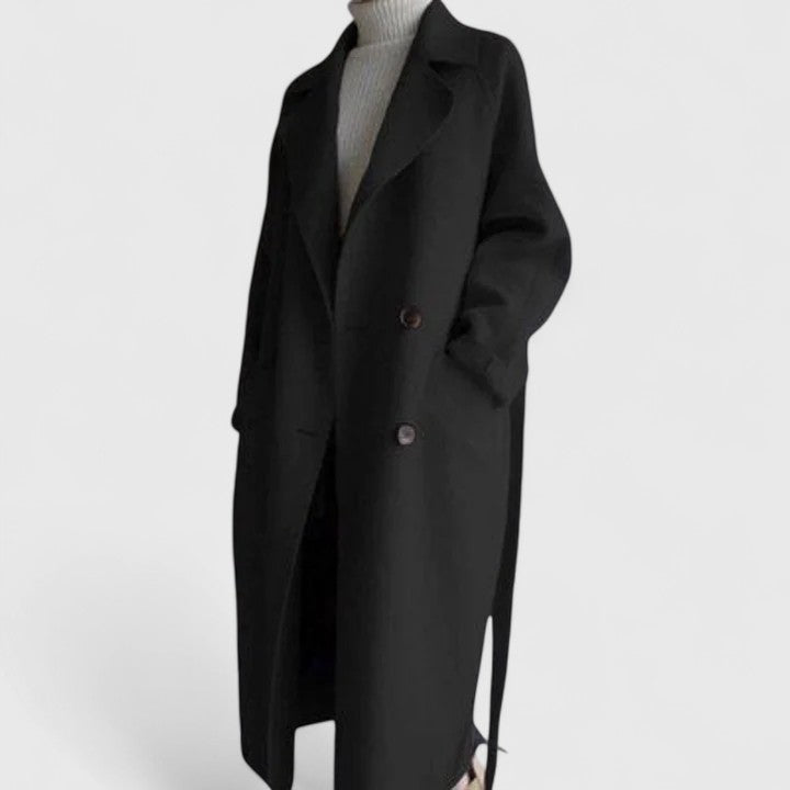 Beige Zyrenya™ elegant coat by Emma & Rose Cape Town displayed on a hanger, showcasing its stylish design and tailored fit.