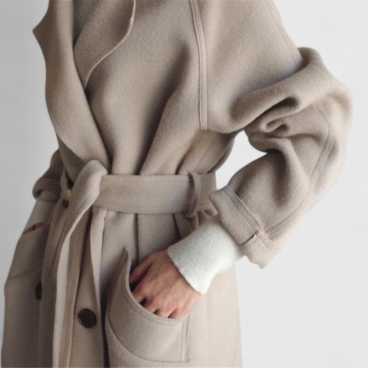 Beige Zyrenya™ Elegant Coat by Emma & Rose Cape Town, stylish long coat with tailored fit and sophisticated design.