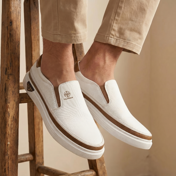 Black Torino™ slip-on PU leather sneakers by Emma & Rose Cape Town, featuring a sleek design and comfortable fit.