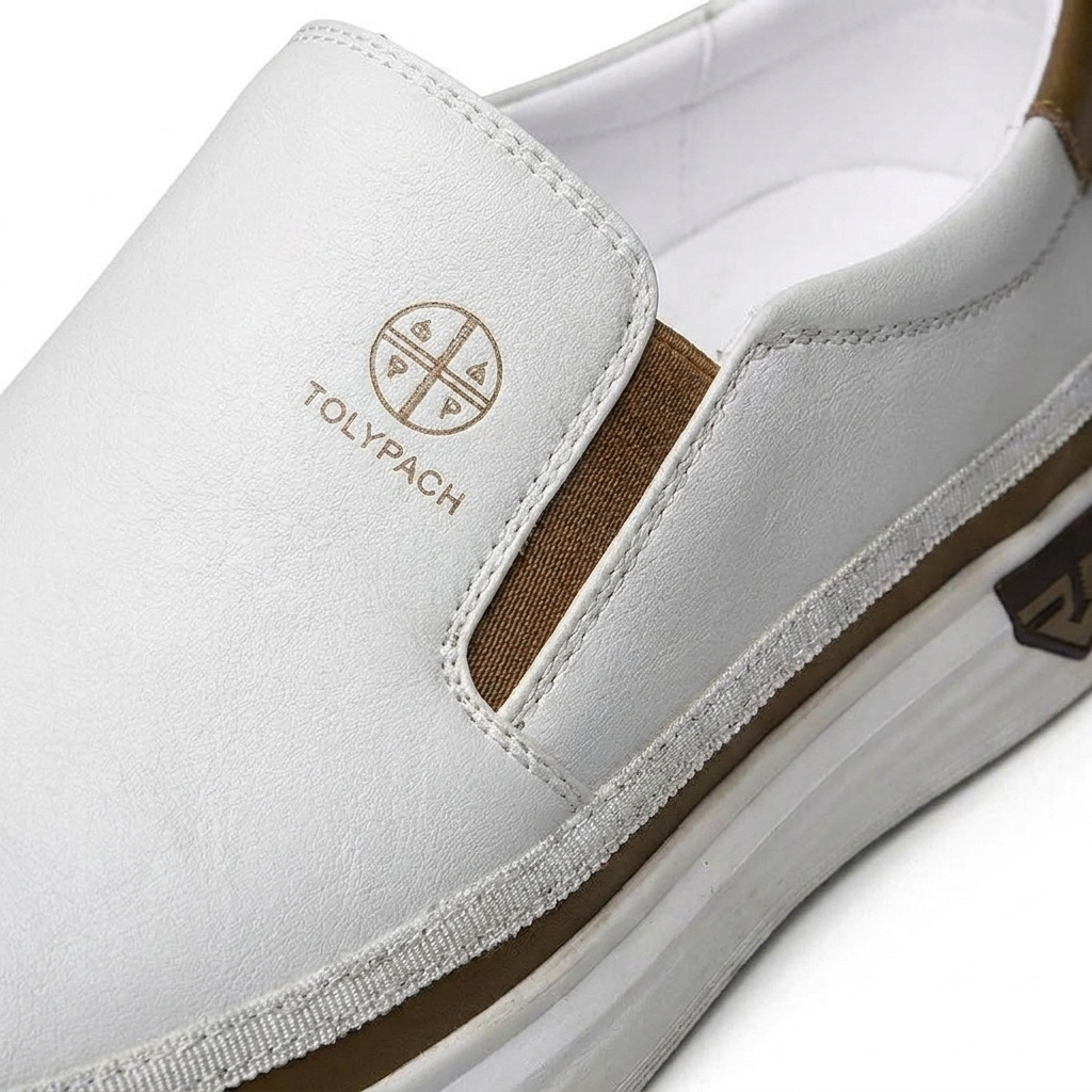 Black Torino™ slip-on sneakers from Emma & Rose Cape Town, made of PU leather with a sleek, comfortable design.