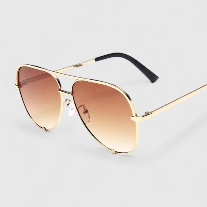 Black and blue Tynzlee™ elegant sunglasses by Emma & Rose Cape Town with stylish frame and tinted lenses.
