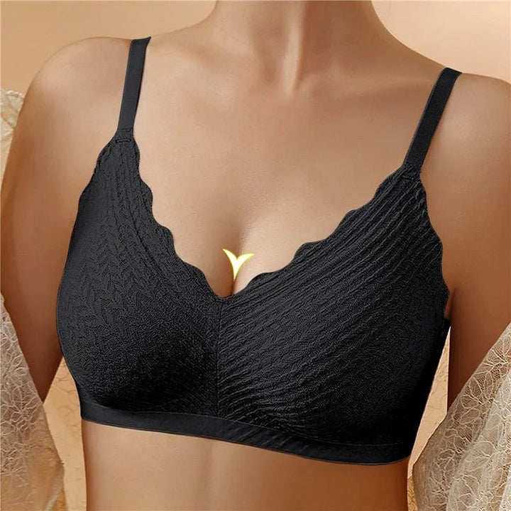 Set of four Emma & Rose Cape Town Venice moisture-wicking bras in black, designed for comfort and active wear.