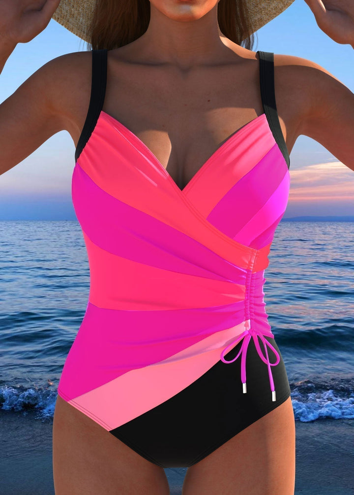 Éloria™ colorful print elegant swimsuit by Emma & Rose Cape Town, featuring vibrant patterns and a sleek, stylish design.