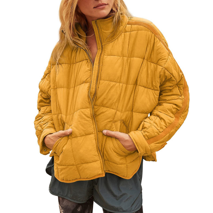 Black April™ Compact Zip Puffer Jacket by Emma & Rose Cape Town, shown with a front view and zip closure.