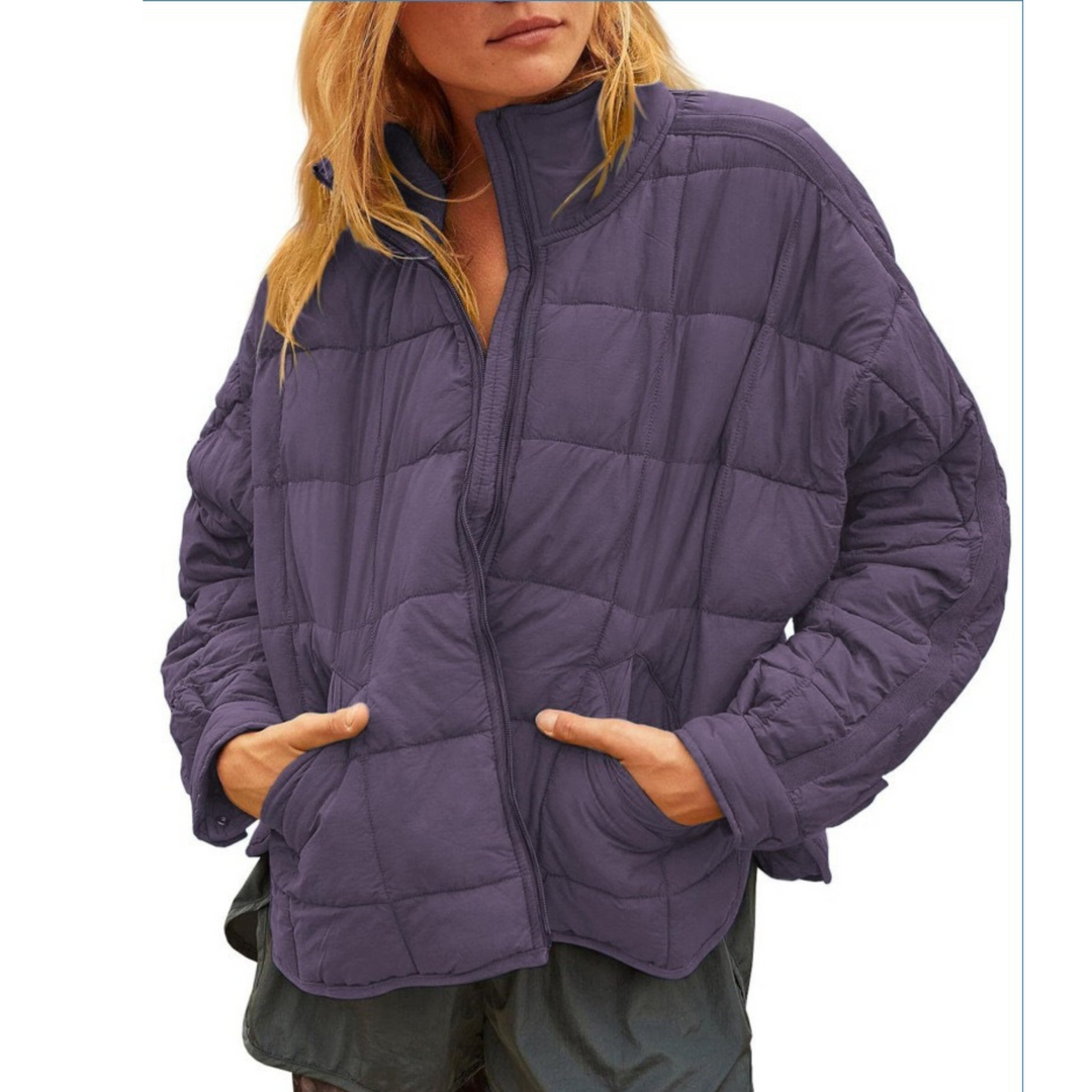 Black April™ Compact Zip Puffer Jacket by Emma & Rose Cape Town, lightweight and padded outerwear with a front zipper.