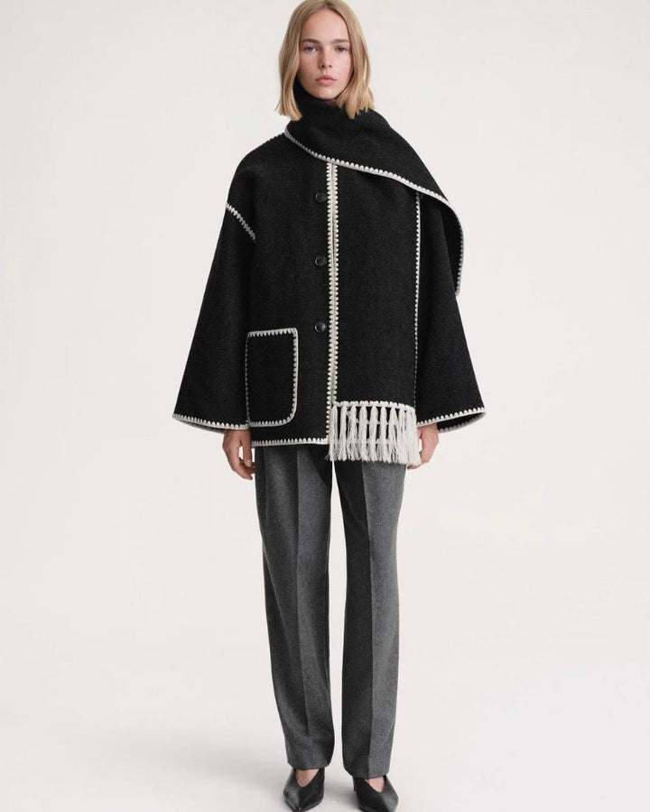 Emma & Rose Cape Town Jayzmarah™ stylish black jacket, shown on a model, featuring a modern design with a sleek fit.
