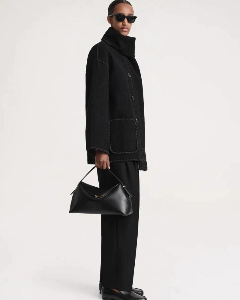 Emma & Rose Cape Town Jayzmarah stylish black jacket, shown on a model with a fitted design and modern collar.