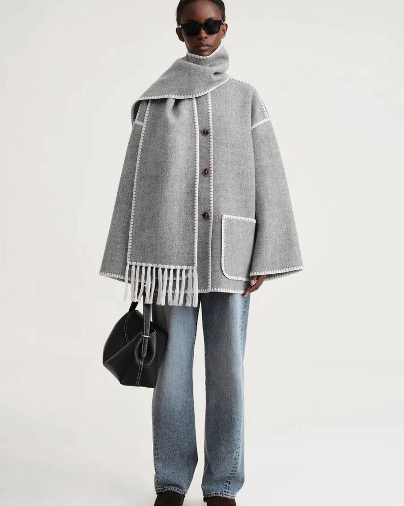 Black Jayzmarah™ stylish jacket by Emma & Rose Cape Town, shown on a model with a modern, fashionable design.