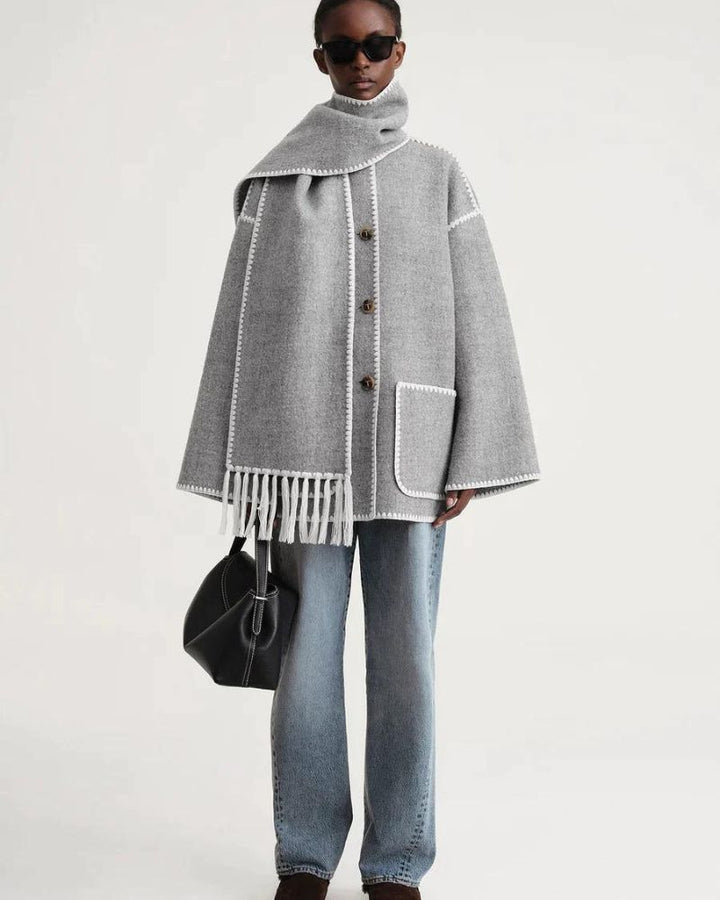 Black Jayzmarah™ stylish jacket by Emma & Rose Cape Town, shown on a model with a modern, fashionable design.