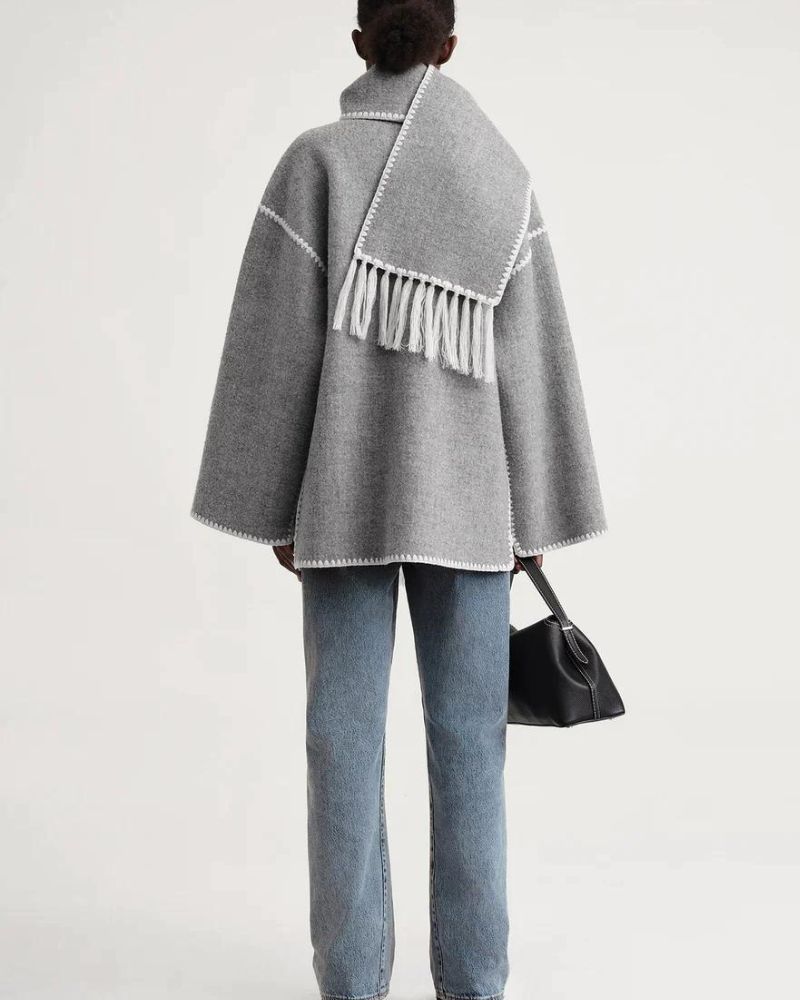 Black Jayzmarah™ stylish jacket by Emma & Rose Cape Town, shown on a model with a modern, fashionable fit.