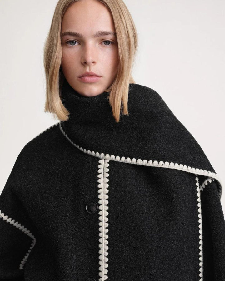 Black Jayzmarah™ stylish jacket by Emma & Rose Cape Town, shown on a model highlighting the modern, tailored design.