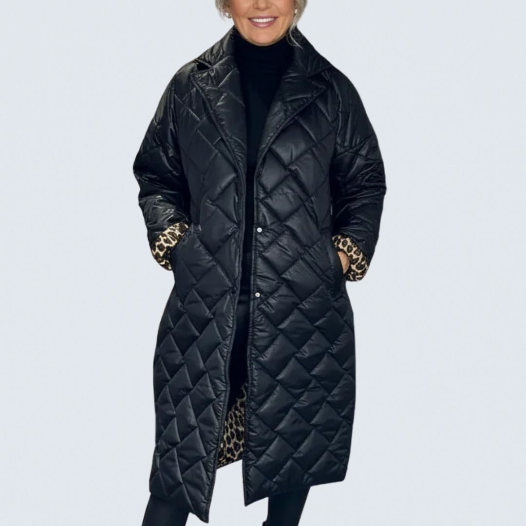 Black Livara™ quilted coat by Emma & Rose Cape Town, featuring a comfortable, stylish design with quilted stitching.