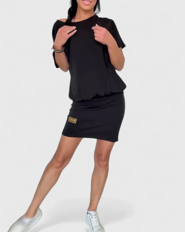 Black Makynzee™ comfortable dress by Emma & Rose Cape Town, featuring a relaxed fit and stylish design.