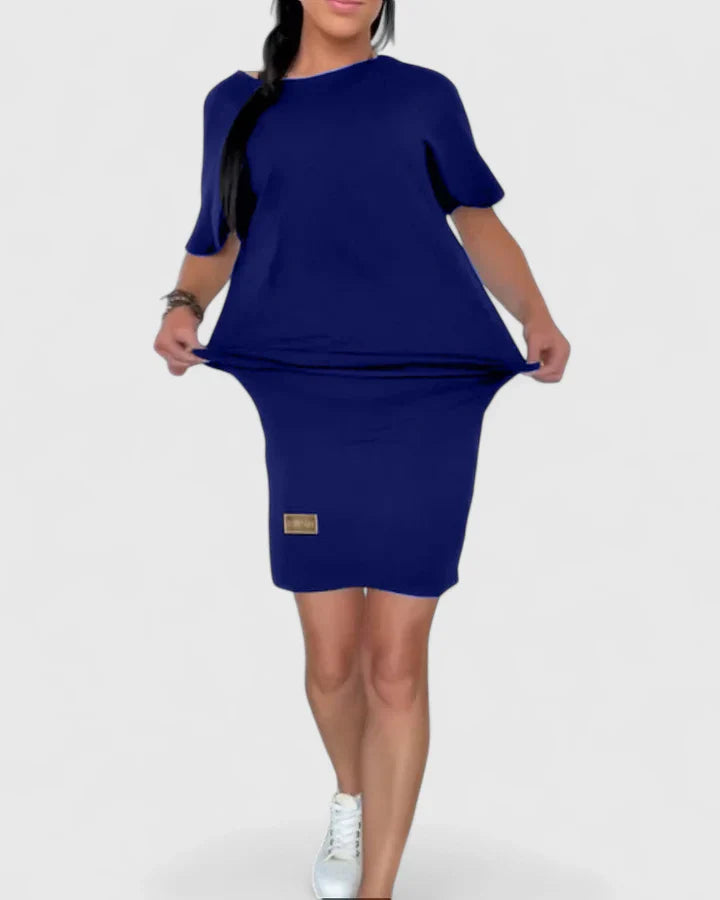 Black Makynzee™ comfortable dress by Emma & Rose Cape Town, shown on a model with a relaxed fit and elegant design.