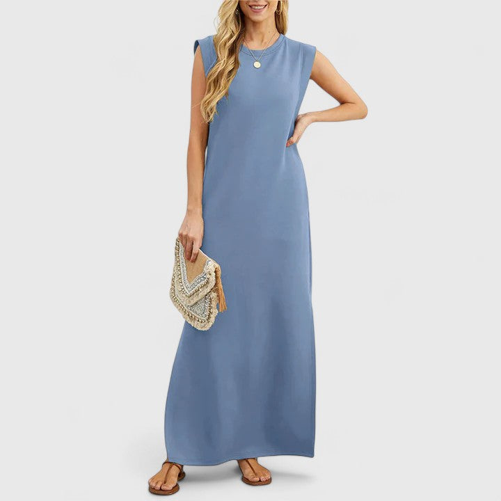 Black Marian™ elegant maxi dress by Emma & Rose Cape Town, featuring flowing fabric and stylish design.