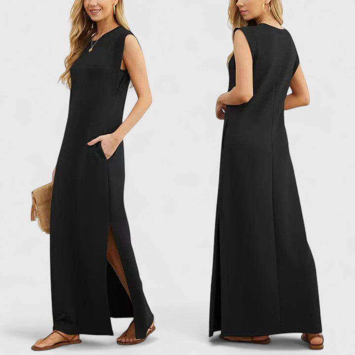 Black Marian™ Elegant Maxi Dress by Emma & Rose Cape Town, featuring flowing fabric and stylish design.