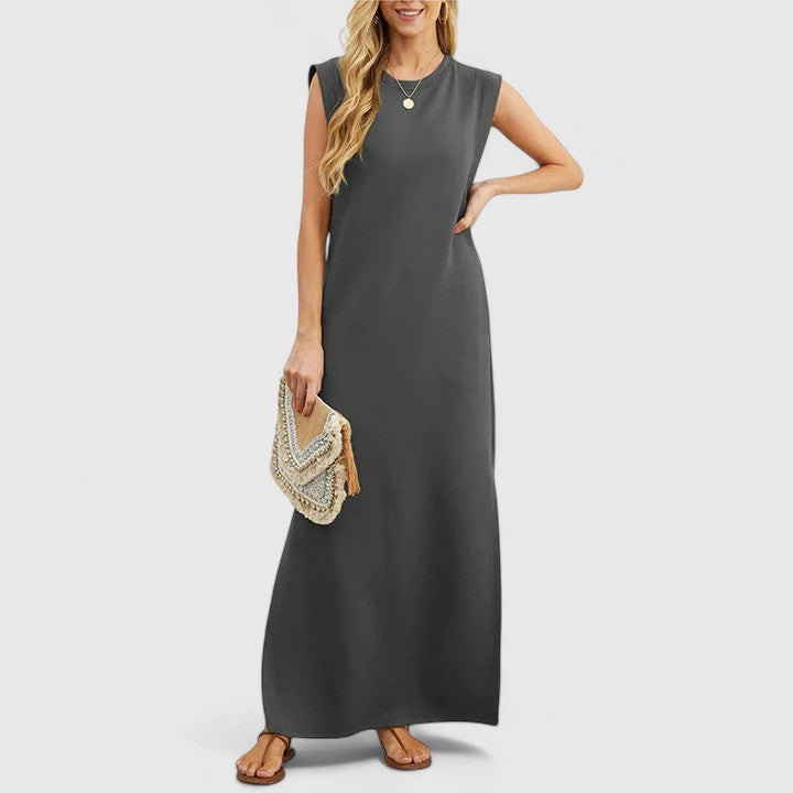 Black Marian™ elegant maxi dress by Emma & Rose Cape Town, flowing fabric, V-neckline, and ankle-length silhouette.