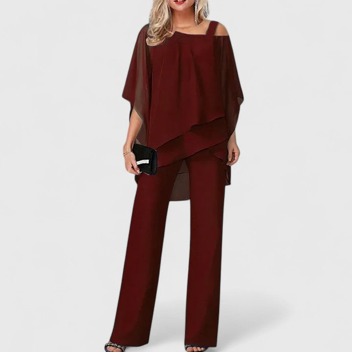 Black Serenity™ two-piece trouser set by Emma & Rose Cape Town, featuring elegant tailored trousers and a matching top.