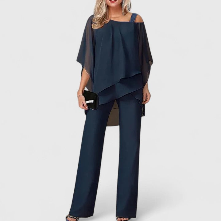 Black Serenity™ two-piece trouser set by Emma & Rose Cape Town, featuring an elegant top and matching trousers.