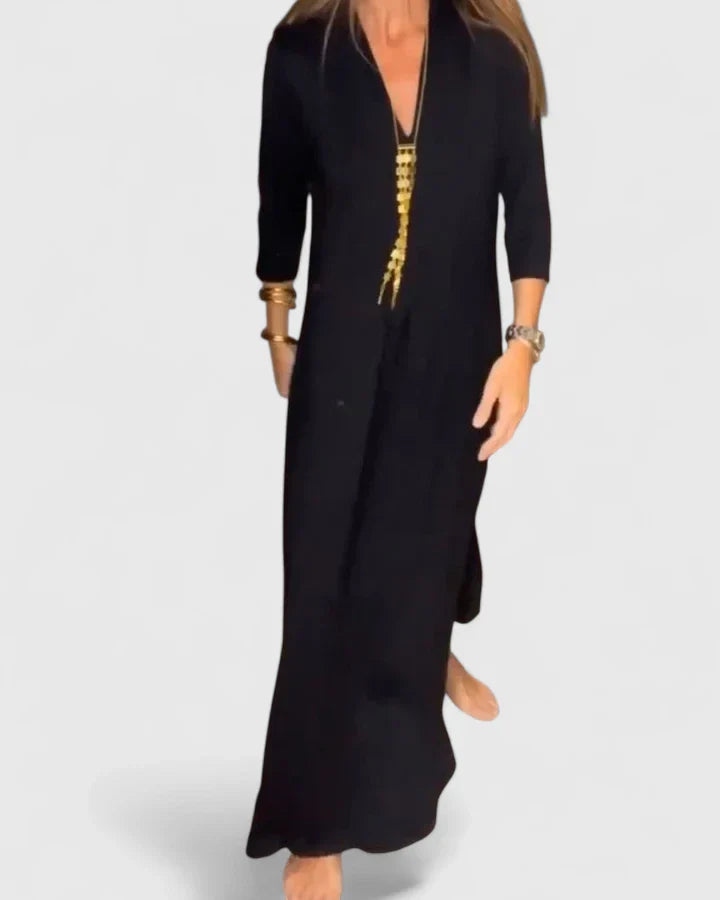 Black Serynahh™ elegant dress by Emma & Rose Cape Town, featuring a stylish, fitted silhouette and sophisticated design.