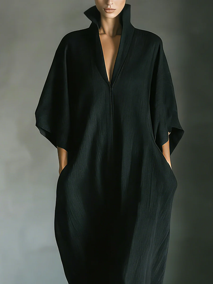 Emma & Rose Cape Town Alessandra oversized black maxi dress in minimalist style, flowing fabric, and relaxed fit.