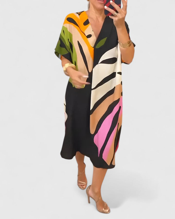Black Cymarie™ comfortable dress by Emma & Rose Cape Town, featuring a relaxed fit and stylish design.