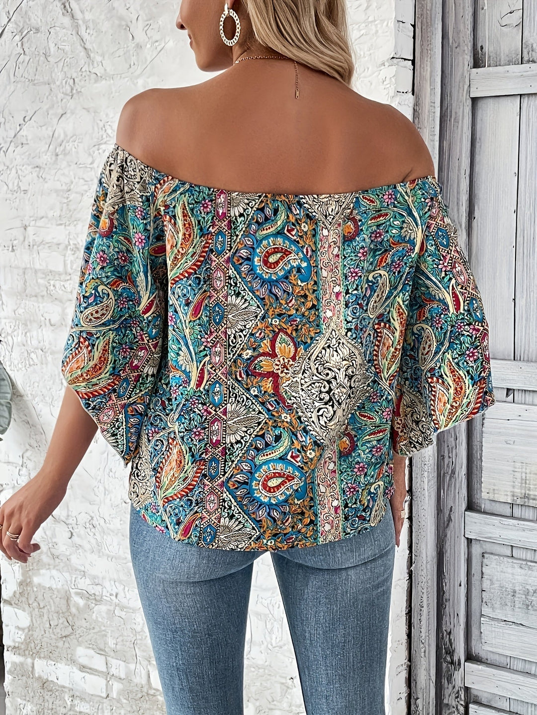Emma & Rose Cape Town Sara™ Axelless Bohemian blouse in vibrant polychrome print, featuring a relaxed fit and flowy fabric.