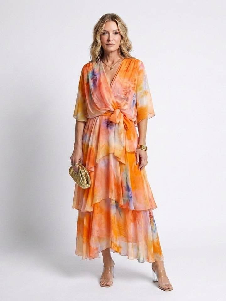 Emma & Rose Cape Town Calista Sheer Layered V Dress in blue, featuring a flowy, layered design and elegant V neckline.