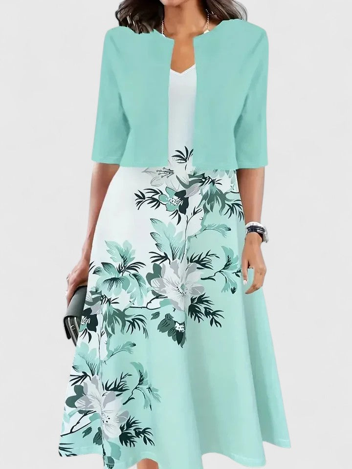 Emma & Rose Cape Town Chantal elegant blue midi dress, stylish and flowy, perfect for sophisticated occasions.