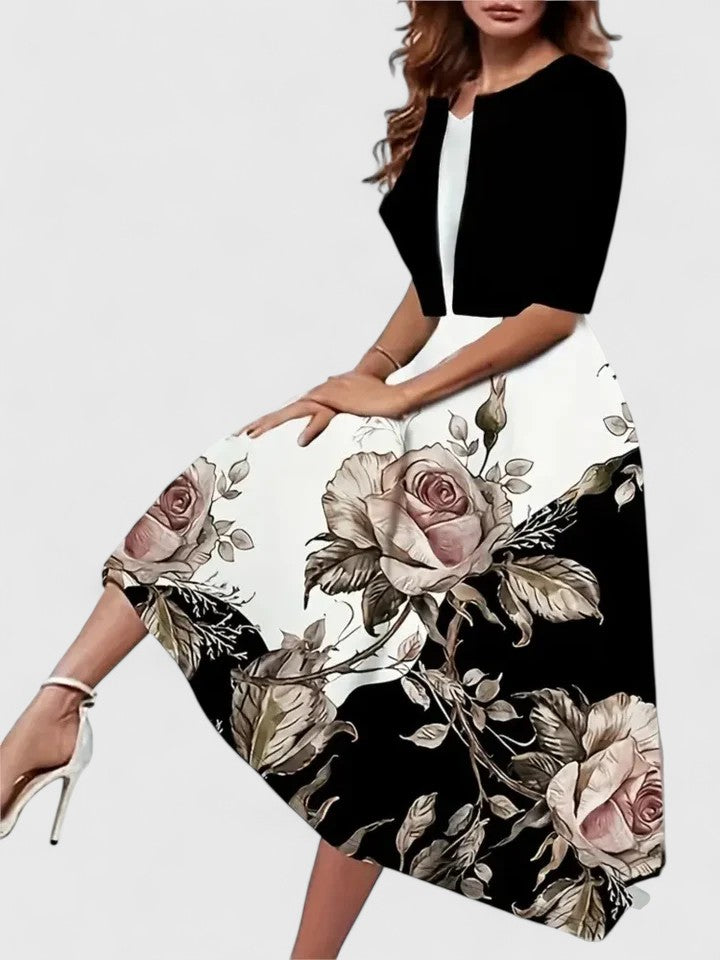 Blue Emma & Rose Cape Town Chantal™ Elegant Midi Dress with fitted waist and flowing skirt, perfect for stylish occasions.