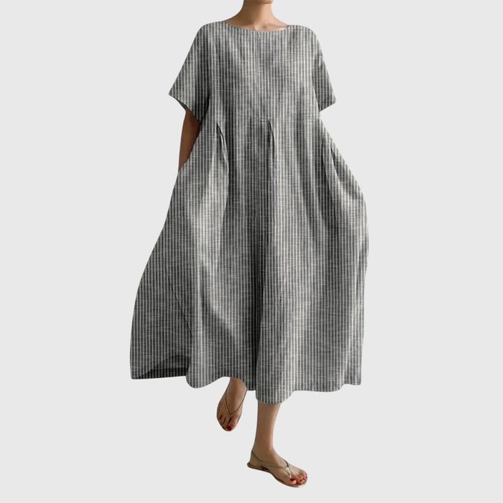 Emma & Rose Cape Town Isabell™ long casual dress in blue, featuring a flowing silhouette and comfortable fabric.