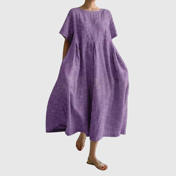 Emma & Rose Cape Town Isabell long casual dress in blue, flowing fabric with a relaxed fit and elegant design.