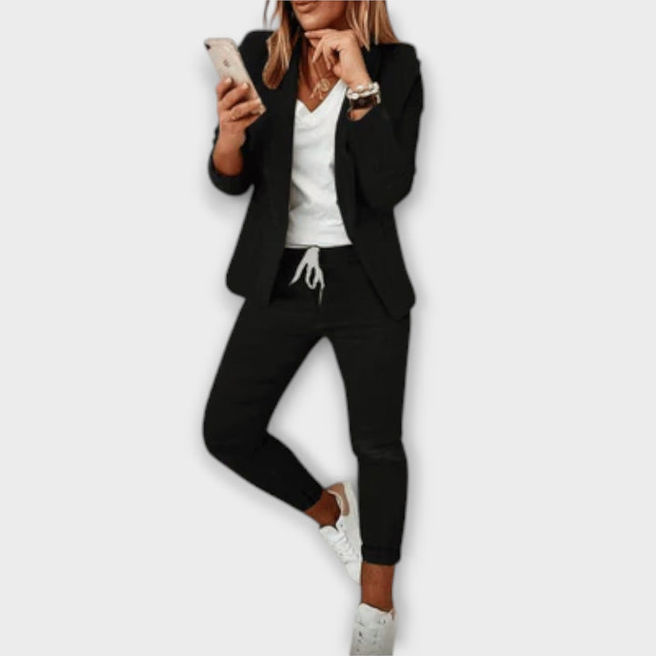 Lyselle™ Elegant blazer set by Emma & Rose Cape Town, featuring a tailored blue blazer and matching pants on a model.