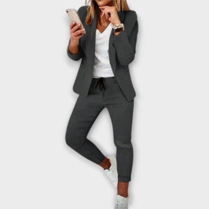 Emma & Rose Cape Town Lyselle™ elegant blazer set featuring a tailored blue blazer and matching trousers.