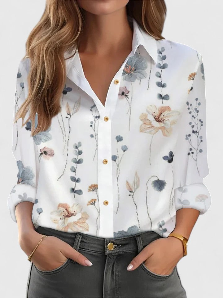 Emma & Rose Cape Town Margot elegant blouse in blue, featuring a stylish, flowy design and feminine details.