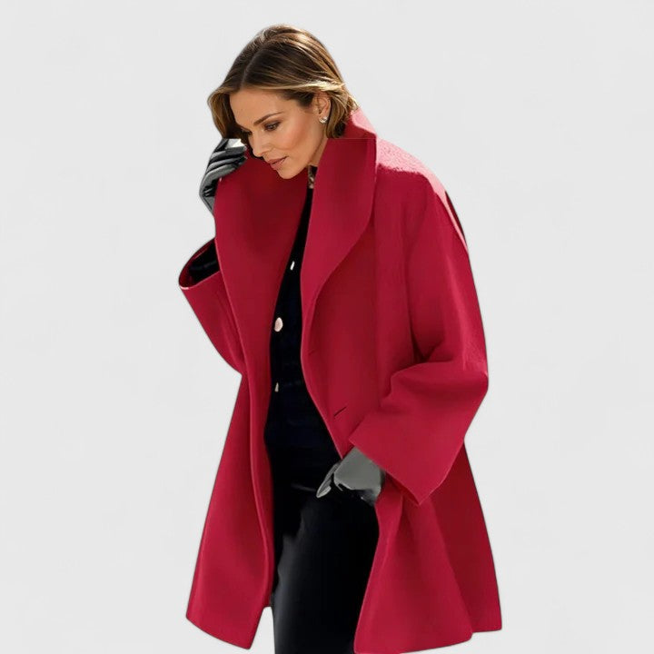 Emma & Rose Cape Town Oravienne™ elegant blue coat displayed on a mannequin with tailored fit and stylish details.