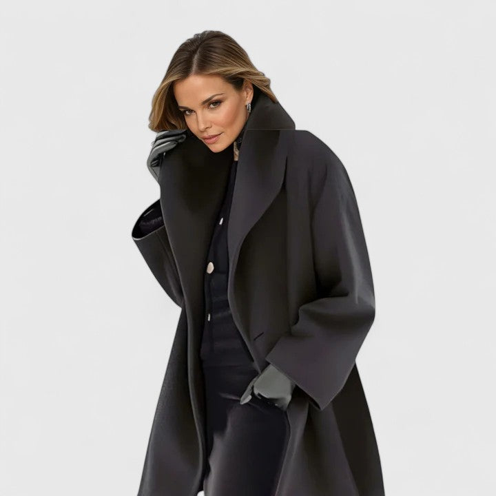 Emma & Rose Cape Town Oravienne™ elegant blue coat, stylish and tailored with a sophisticated design, shown on a model.
