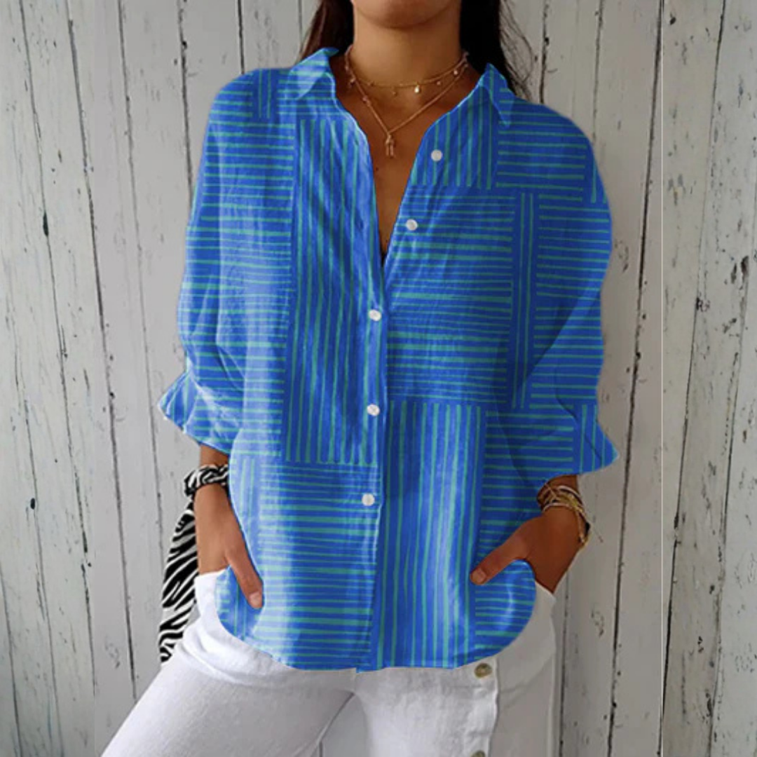 Amy™ Azure Stripe Blouse by Emma & Rose Cape Town, featuring a stylish blue and white striped design on lightweight fabric.