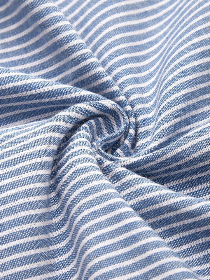 Emma & Rose Cape Town Sofia striped summer dress in blue, lightweight fabric, with a stylish striped pattern and sleeveless design.