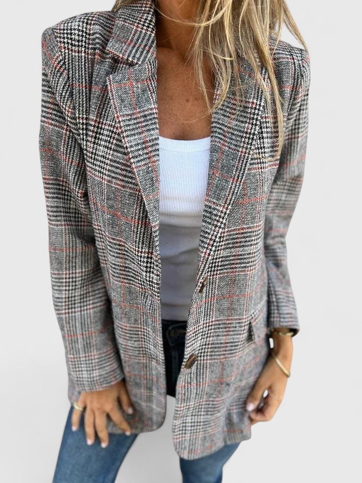 Brown Soralyetta™ comfortable blazer from Emma & Rose Cape Town, shown on a model with a tailored fit and lapel collar.
