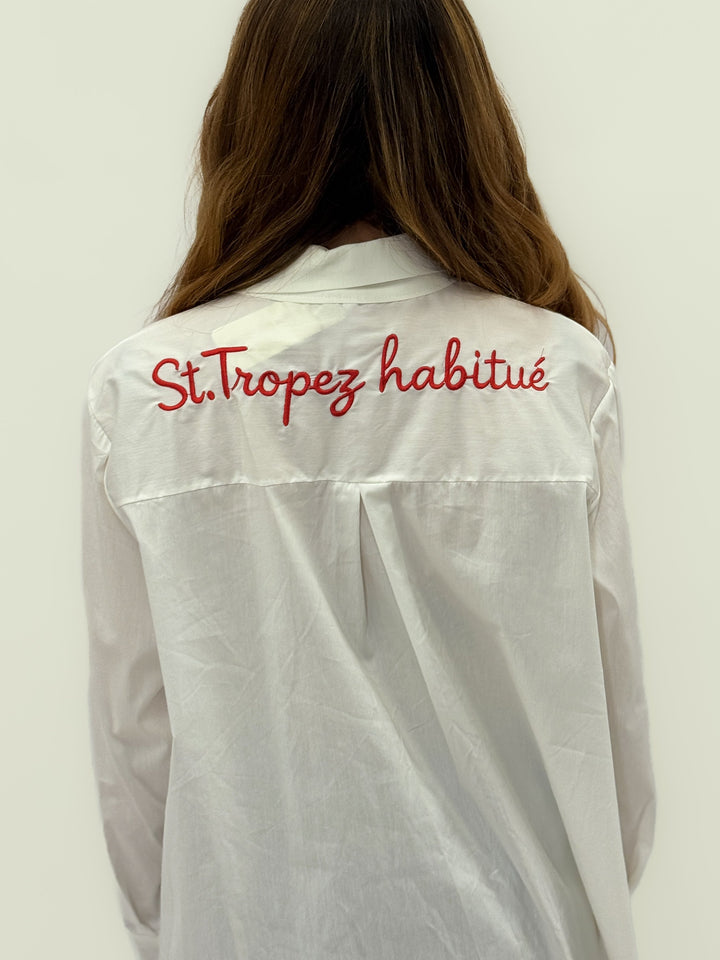 Light blue Rina long shirt by Emma & Rose Cape Town with intricate embroidery on the back, styled as a casual camicie.