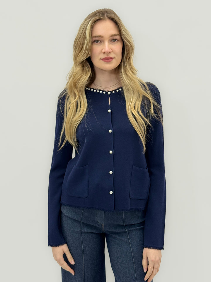 Black Doreen Emma & Rose Cape Town cardigan with elegant pearl button details, showcasing a stylish knit cardigan.