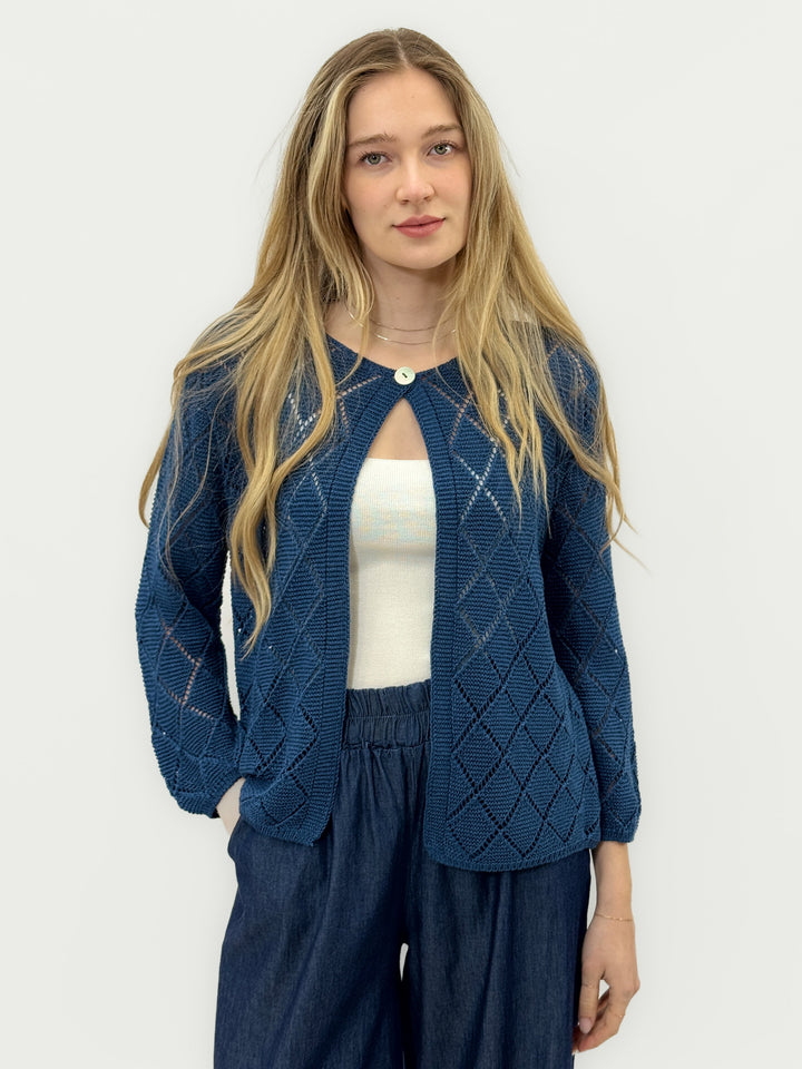 Blue Janneke™ cardigan by Emma & Rose Cape Town with diamond pattern openwork design and open closure.