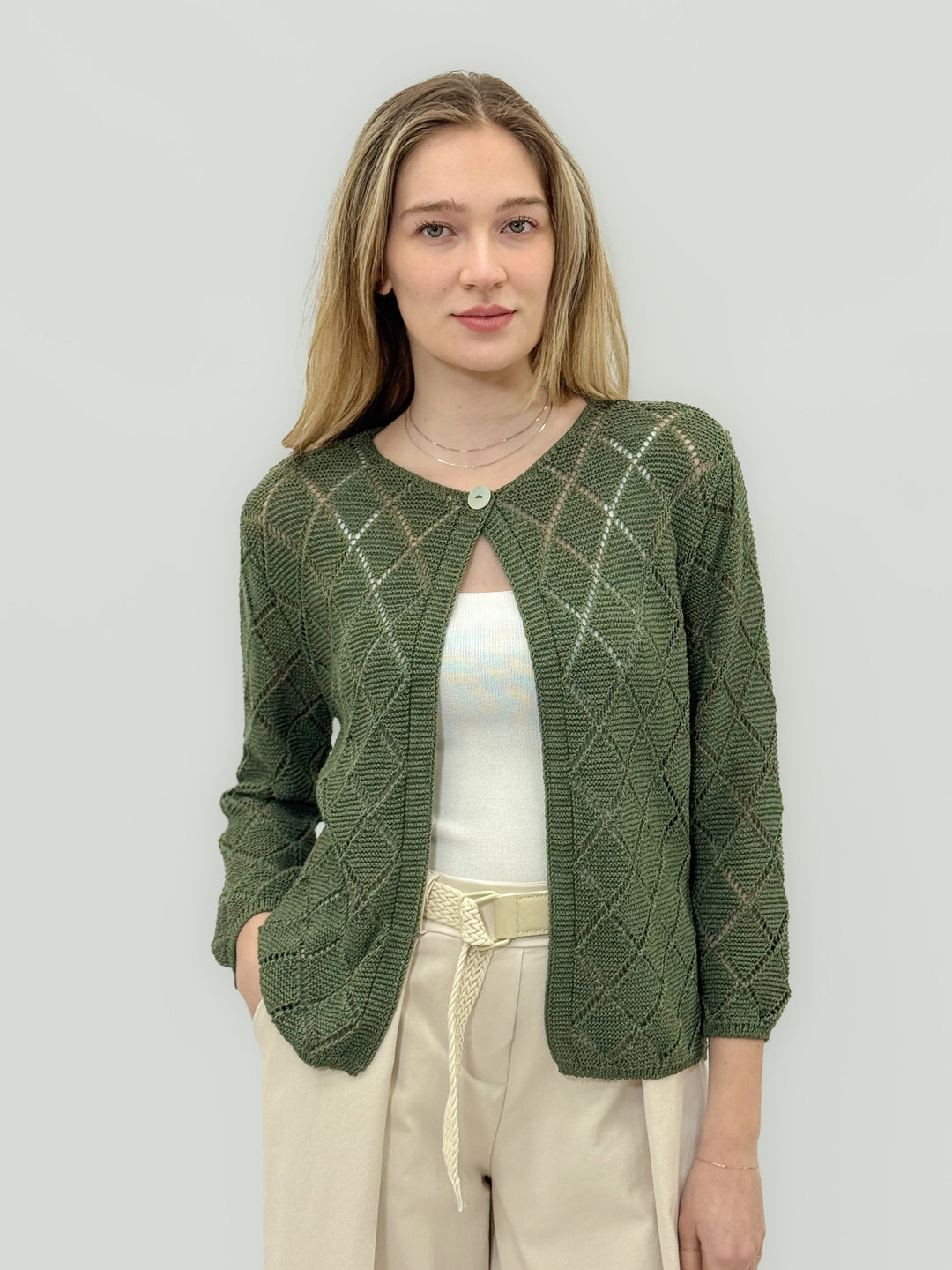Blue Janneke™ cardigan by Emma & Rose Cape Town featuring a diamond pattern, openwork design, and open closure.