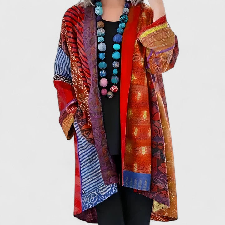 Blue Calirenne™ elegant women's cardigan by Emma & Rose Cape Town, featuring a soft knit fabric and stylish design.