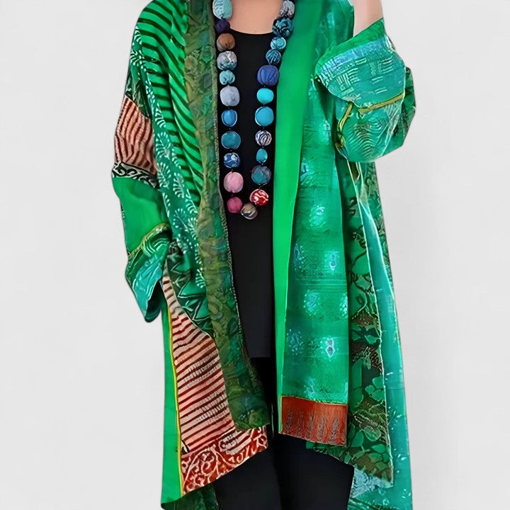 Blue Calirenne™ elegant women's cardigan by Emma & Rose Cape Town, featuring a soft, stylish knit design.