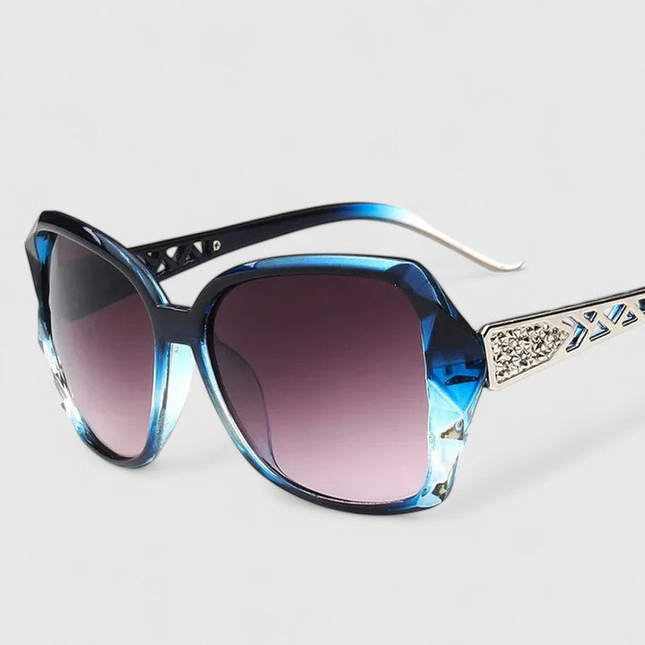 Emma & Rose Cape Town Avalynne sophisticated sunglasses with champagne-colored frames and stylish design.