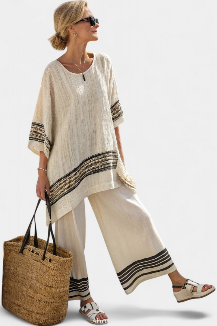 Emma & Rose Cape Town Anzaleira™ elegant striped clothing set with orange and white patterns, featuring a stylish, coordinated design.