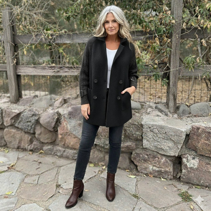 Taupe Emma & Rose Cape Town Vaesa™ sophisticated coat with tailored fit and elegant design, displayed on a hanger.