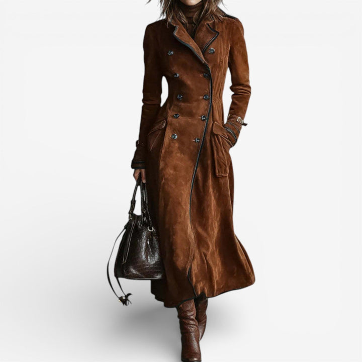 Dark brown Nathaly™ velvety trench coat by Emma & Rose Cape Town, shown on a hanger with a smooth, soft fabric appearance.